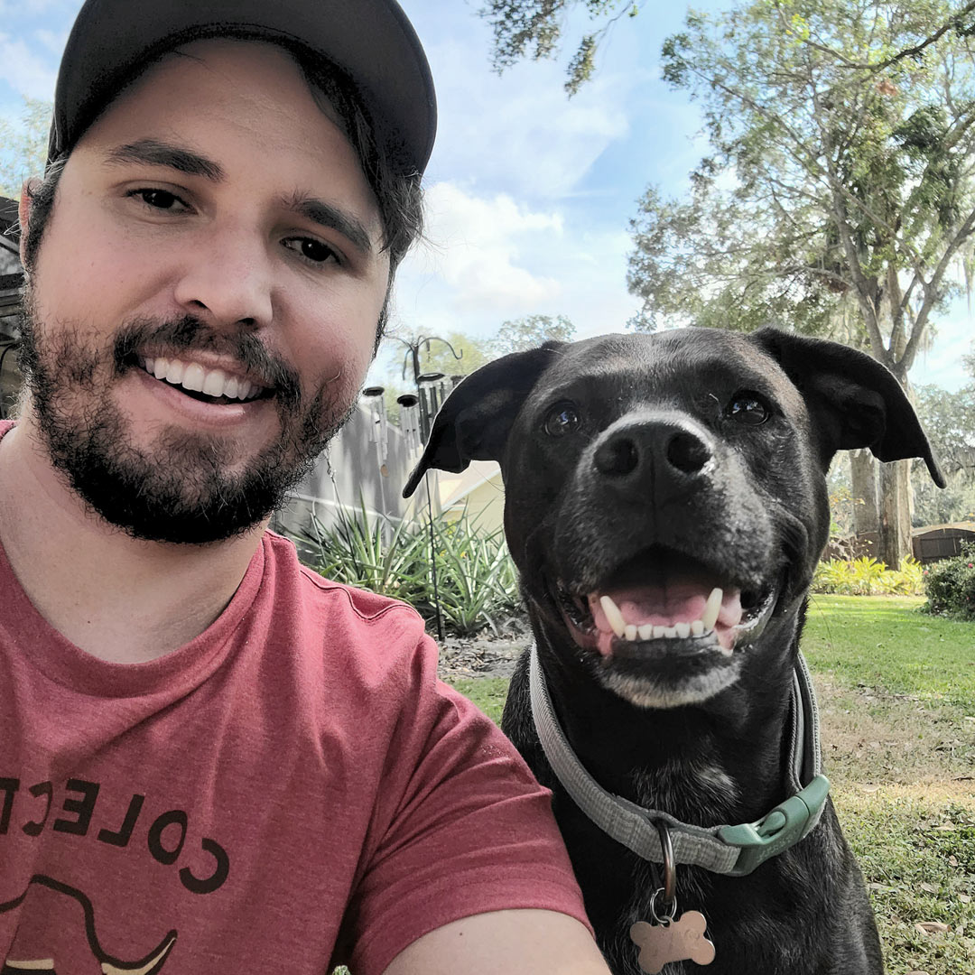 An image of tonia at desk smiling